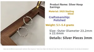 Detailed view of S925 sterling silver hoop earrings with irregular hammered texture