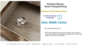 Detail view of S925 sterling silver heart ring showing 7.6mm width and 4.3g weight