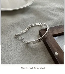 Detail of S925 sterling silver bracelet showing hammered texture and chunky chain link