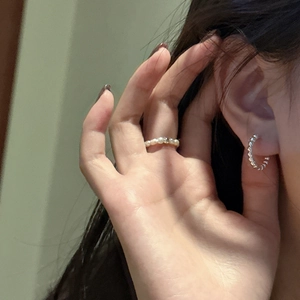 Minimalist S925 sterling silver beaded hoop earrings and pearl ring worn by a model