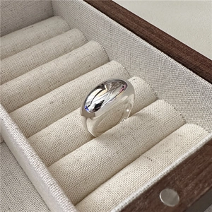 Polished S925 sterling silver chunky minimalist ring displayed in a premium wooden jewelry box
