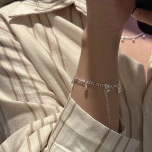 Minimalist S925 sterling silver bracelet featuring polished water drop charms for women