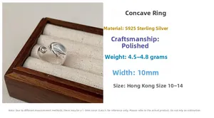 Macro detail of polished S925 sterling silver concave ring in a wooden jewelry gift box