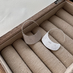 S925 sterling silver brushed metal drop earrings with a modern crescent-shaped design