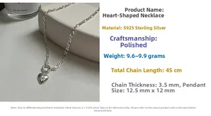 Macro detail of S925 sterling silver Figaro heart necklace with star pattern and diamond