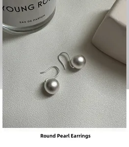 Minimalist S925 sterling silver matte ball earrings with elegant silver hook design