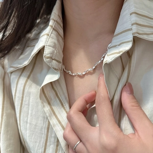 Minimalist S925 sterling silver twisted rope chain necklace with pleated texture on model