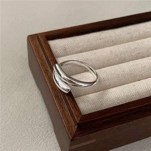 S925 sterling silver minimalist crossover open ring with high polish finish in a box