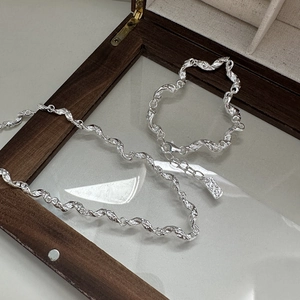 Minimalist S925 sterling silver necklace and bracelet set with twisted wavy texture