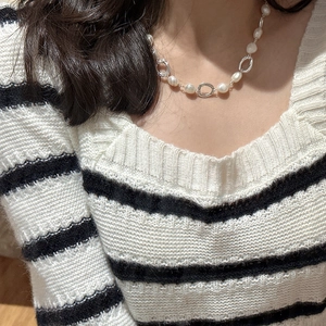 Elegant S925 sterling silver necklace with irregular pearls and striped knit sweater