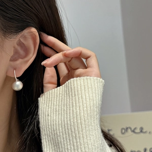 Minimalist S925 sterling silver sphere drop earrings with a matte frosted finish