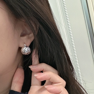 Sparkling S925 sterling silver faceted ball earrings with reflective laser-cut surface