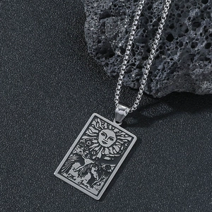Stainless steel tarot necklace featuring 'The Sun' pendant on a classic box chain