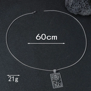 Macro detail of The Sun tarot pendant showing dimensions 60cm and weight 21g