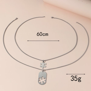 Detailansicht der Puzzle-Halskette in Silber mit 60cm Kettenlänge und 35g Gewichtsanzeige
