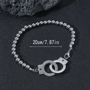 Poliertes Stahlperlen-Handschellenarmband auf dunklem Stein, Länge 20cm/7,87 Zoll