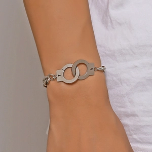 Polished silver titanium steel handcuff bracelet for men and women on a wrist