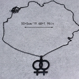Detail showing matte black double venus pendant necklace with 50+5cm chain measurement