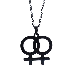 Detail of matte black double female symbol pendant with interlocking stainless steel rings