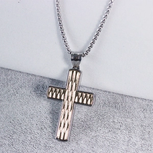 Men's silver and gold cross pendant with knife pattern on a stainless steel box chain