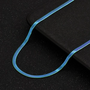 Rainbow gradient snake bone chain necklace in minimalist flat metal weave style