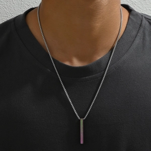 Detailed view of rainbow gradient rectangular bar pendant on silver Venetian chain