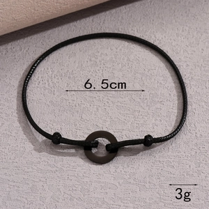 Minimalist black woven rope bracelet with 6.5cm inner diameter ring detail