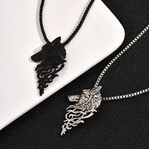Retro wolf head pendant necklaces in black and silver finishes with vintage textures