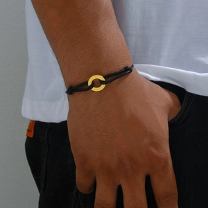 Minimalist black braided cord bracelet with adjustable golden stainless steel ring charm