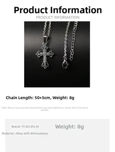 Detail view of silver hollow cross pendant with sparkling rhinestones on 50+5cm chain