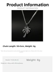 Detail view of tropical coconut tree pendant with zircon crystals and dimensions