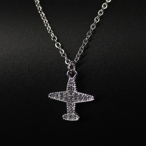 Sparkling airplane pendant necklace with full rhinestones on a silver link chain