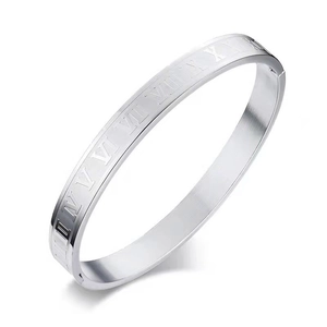 Classic stainless steel bangle with embossed Roman numerals and invisible side clasp