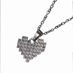 Minimalist silver pixel art heart pendant necklace with shimmering rhinestone pave setting