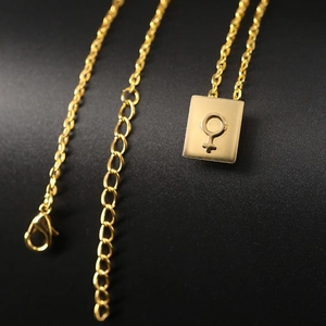 Gold stainless steel necklace featuring a rectangular Venus symbol pendant on a fine O-chain