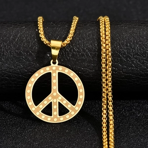 Collier pendentif signe de paix doré avec texture pointillée sur chaîne box