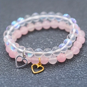 Ensemble de deux bracelets en perles avec pendentifs cœur évidé pour hommes et femmes