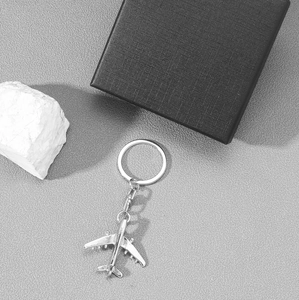 Creative silver airplane keychain with metal model pendant and premium gift box set