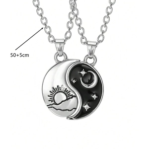 Detail showing yin yang sun and moon pendants with 50+5cm adjustable chain lengths