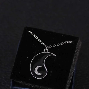 Celestial star moon crescent pendant necklace in black enamel on velvet display box