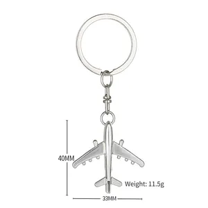 Silver 3D airplane model keychain made of zinc alloy with dimension specs 40x33mm