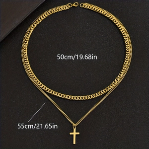 Double-layer stainless steel Cuban chain necklace with cross pendant on black background
