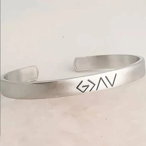 Minimalist silver stainless steel open C-shape bracelet with engraved geometric symbols