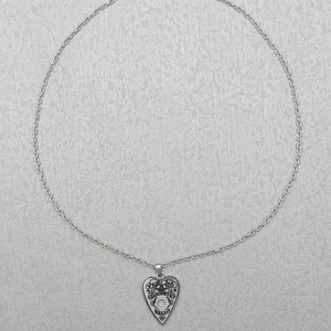Stainless steel hollow heart necklace with vintage Ouija board style engraving