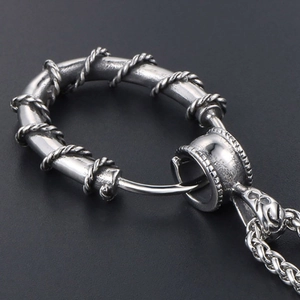 Vintage stainless steel ring pendant necklace with thorn wrap detail and wheat chain