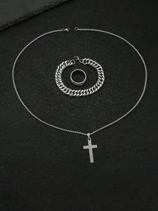 Three-piece silver stainless steel set with cross necklace, Cuban bracelet, and textured ring