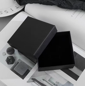 Minimalist matte black gift box with frosted paper texture for jewelry or small watches