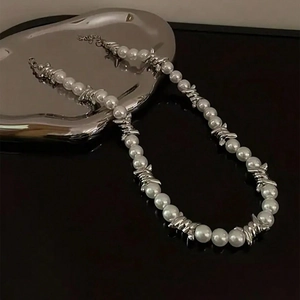 Elegant men's necklace featuring white pearls and silver-tone barbed wire chain links