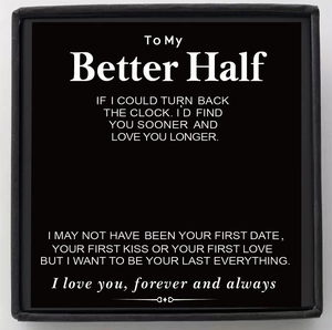 Minimalist black gift card featuring romantic white text in an elegant matte gift box