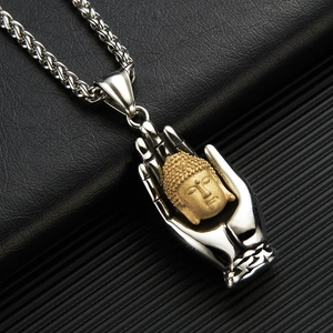 Vintage silver Buddha necklace with gold head pendant and polished palm design